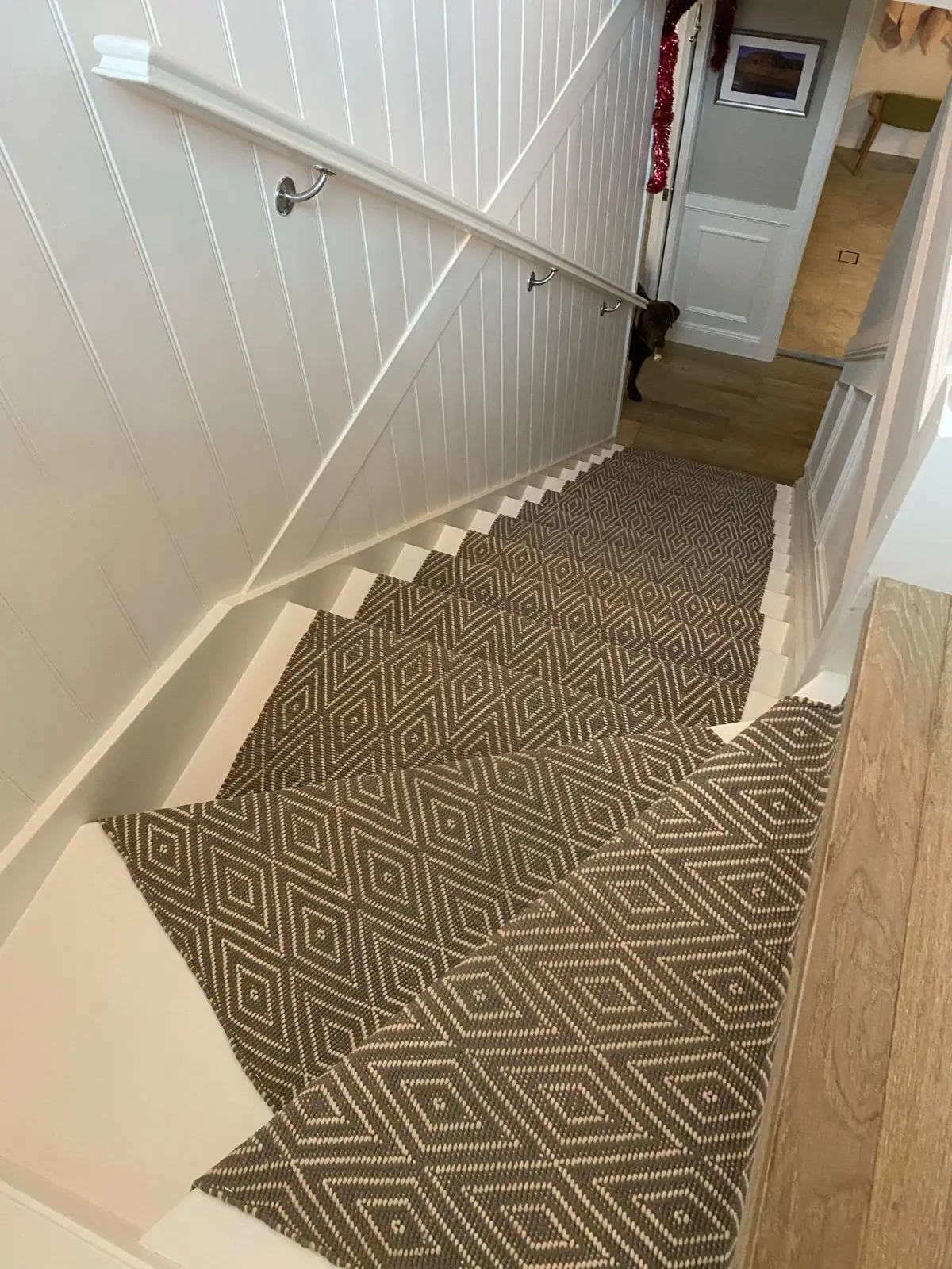 Baulkham Hills — finished white stairwell with patterned runner